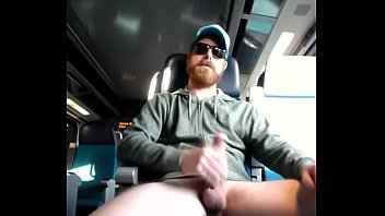 Horny ginger bear strips naked and cums in the train